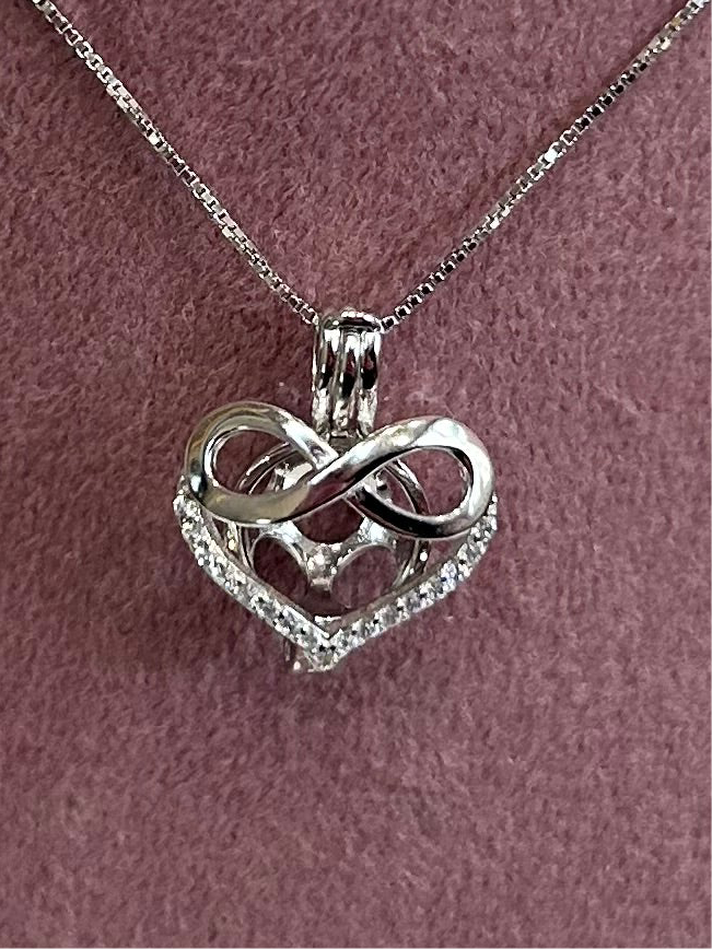 Sterling silver infinity heart cage