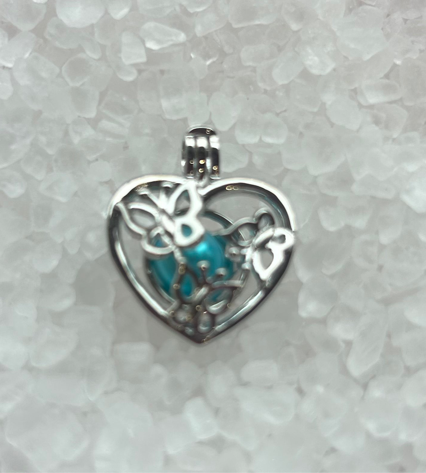 Silver plated butterfly cage pendant