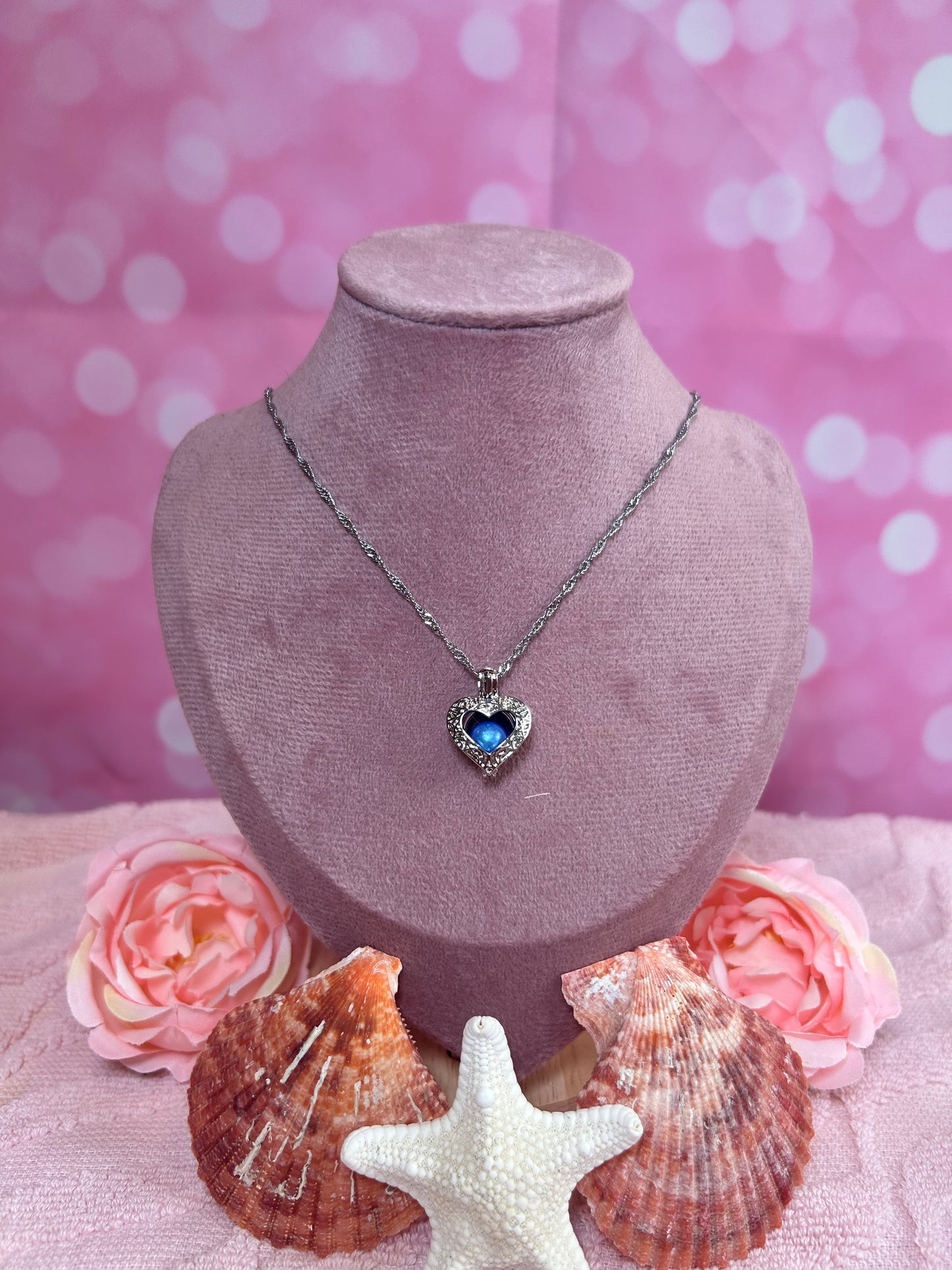 Silver plated open heart cage pendant