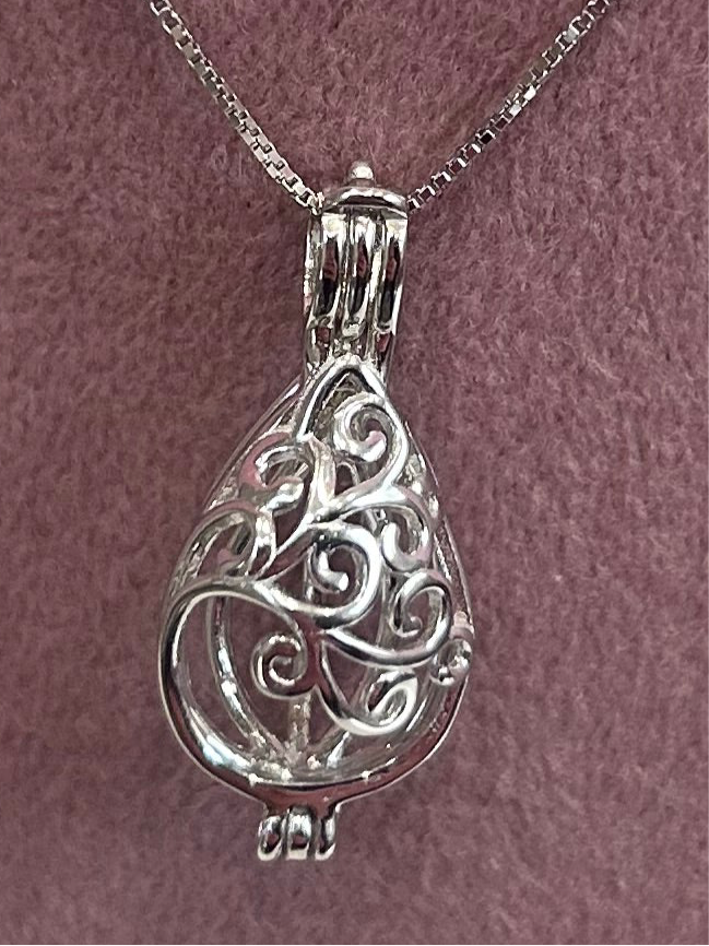 Sterling silver swirl drop cage pendant