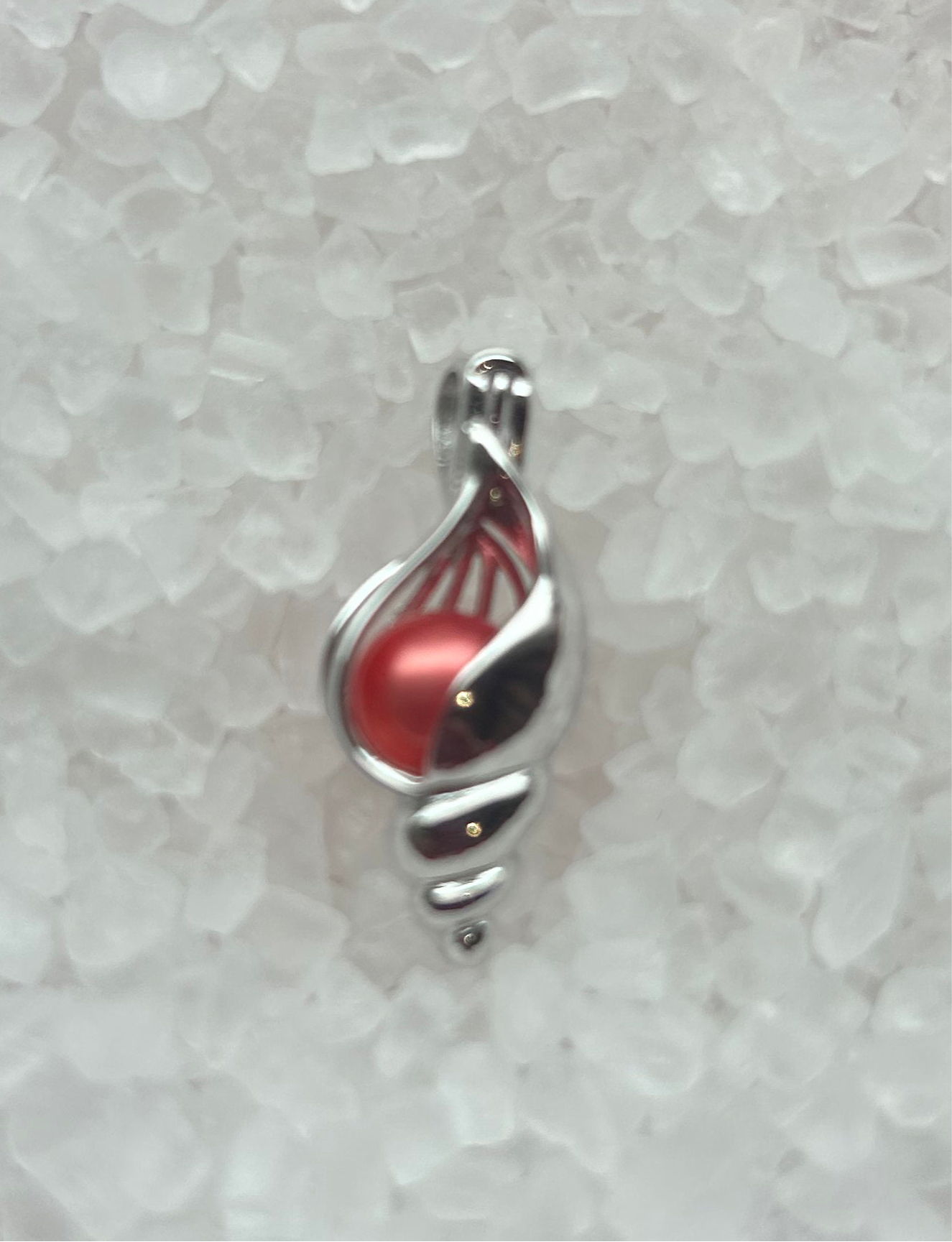 Sterling silver seashell cage pendant