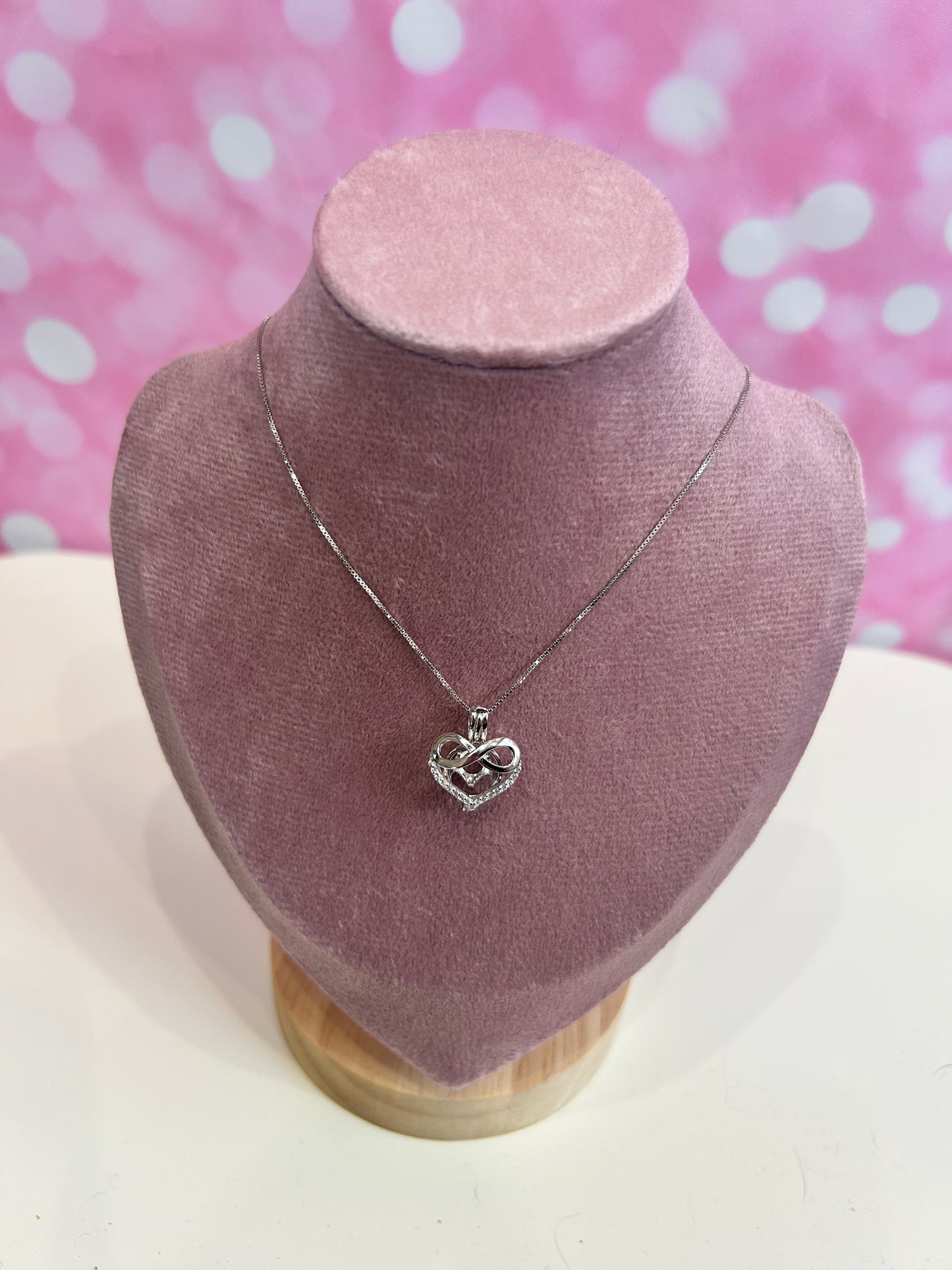 Sterling silver infinity heart cage