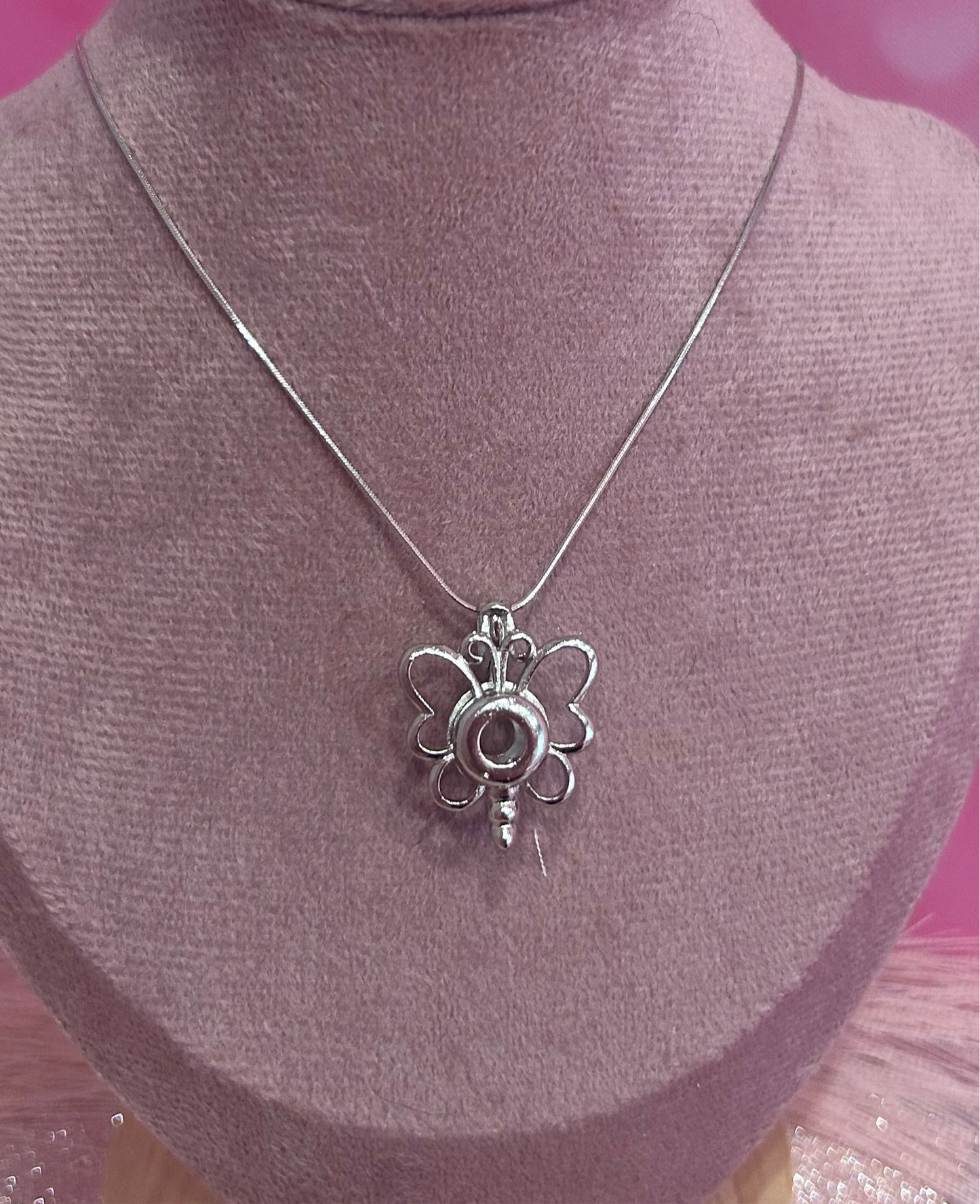Silver plated butterfly cage pendant