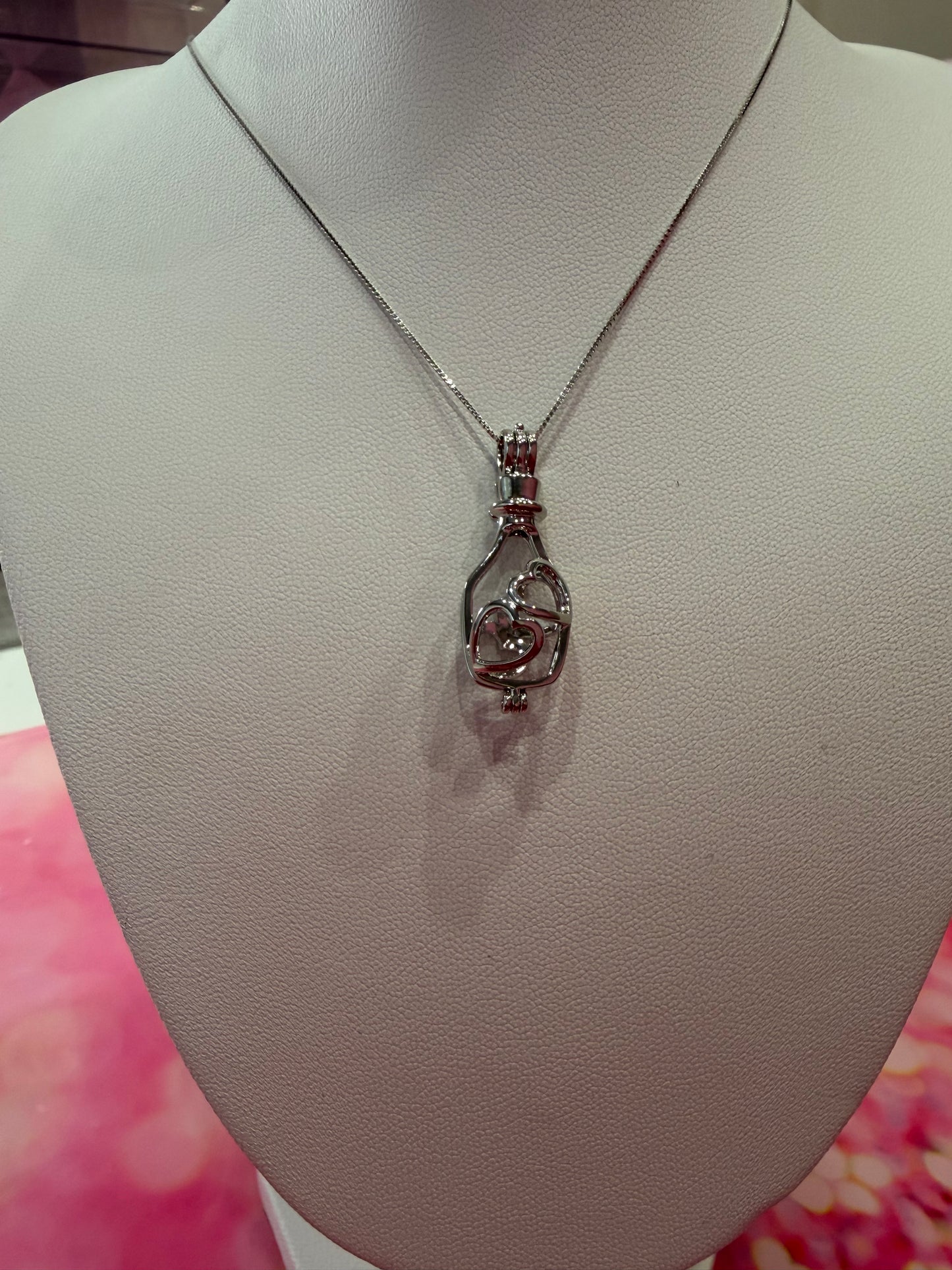 Silver plated champagne bottle with hearts 💕