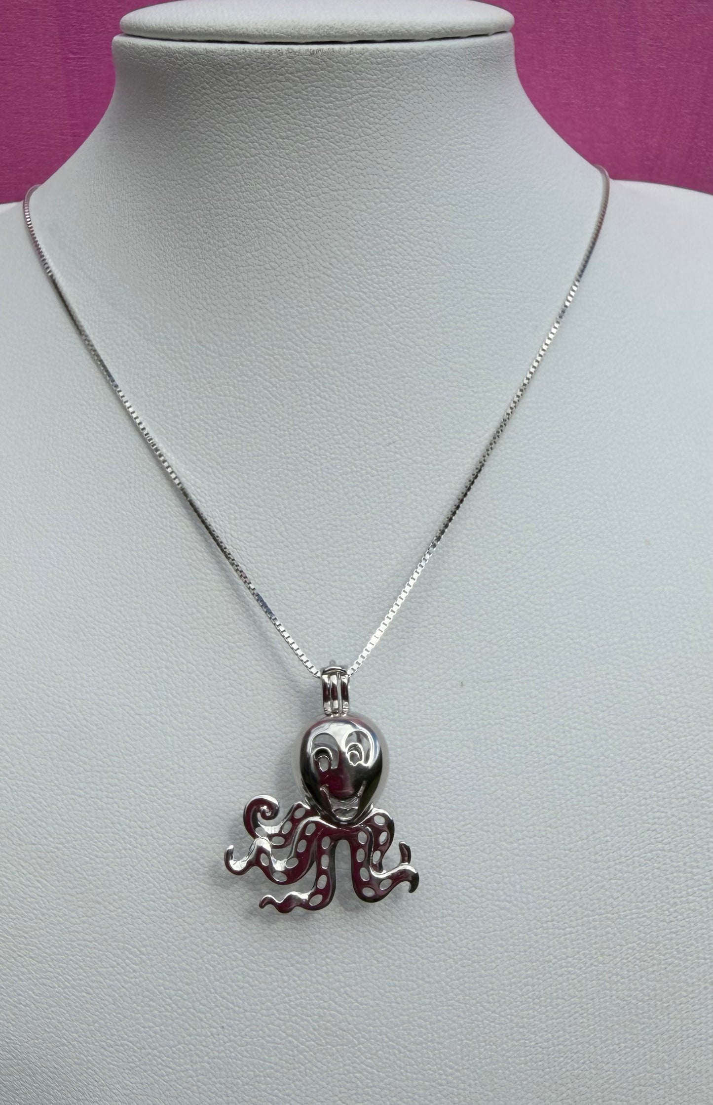 Sterling silver octopus cage pendant