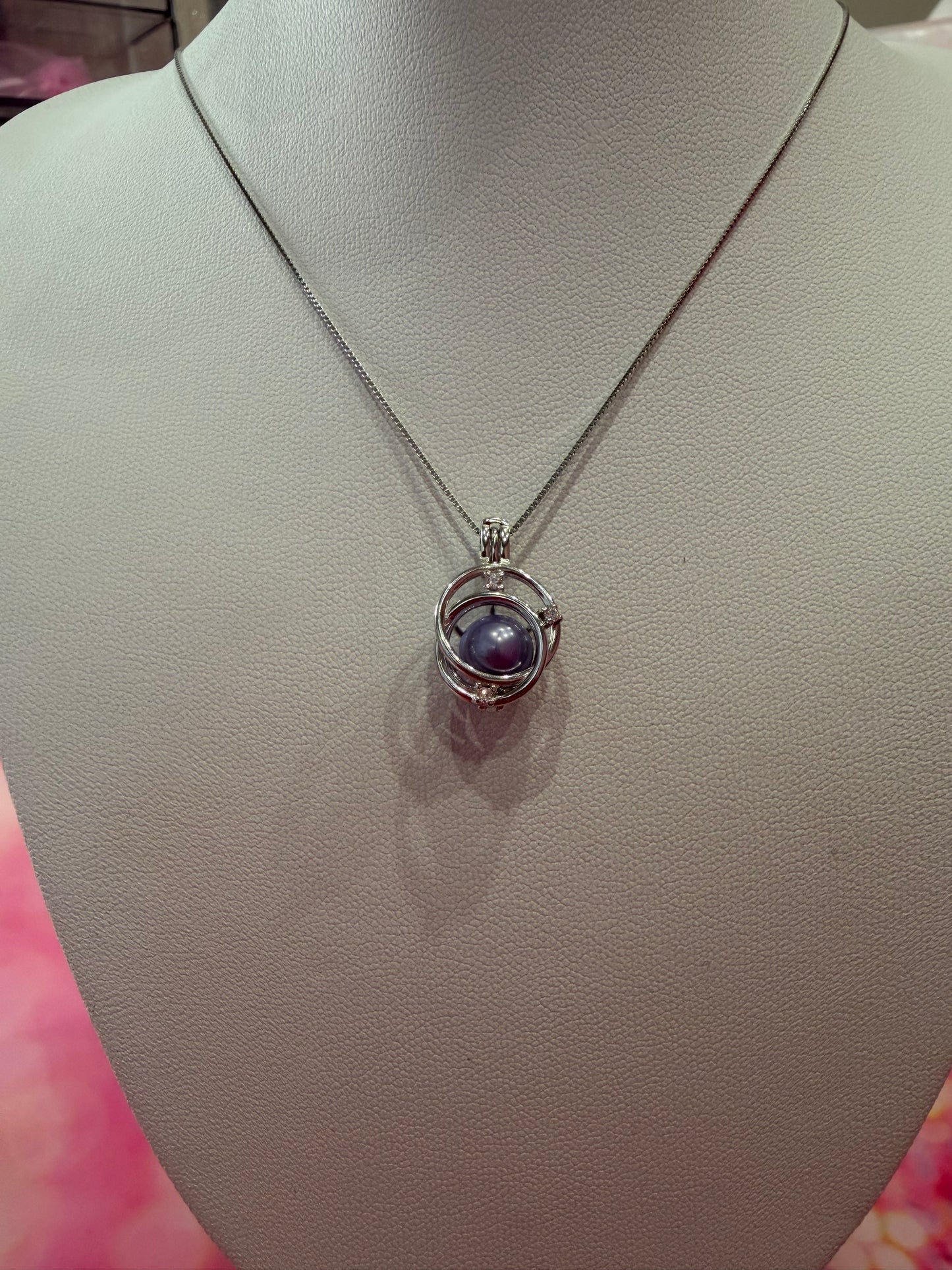 Sterling silver halo cage pendant