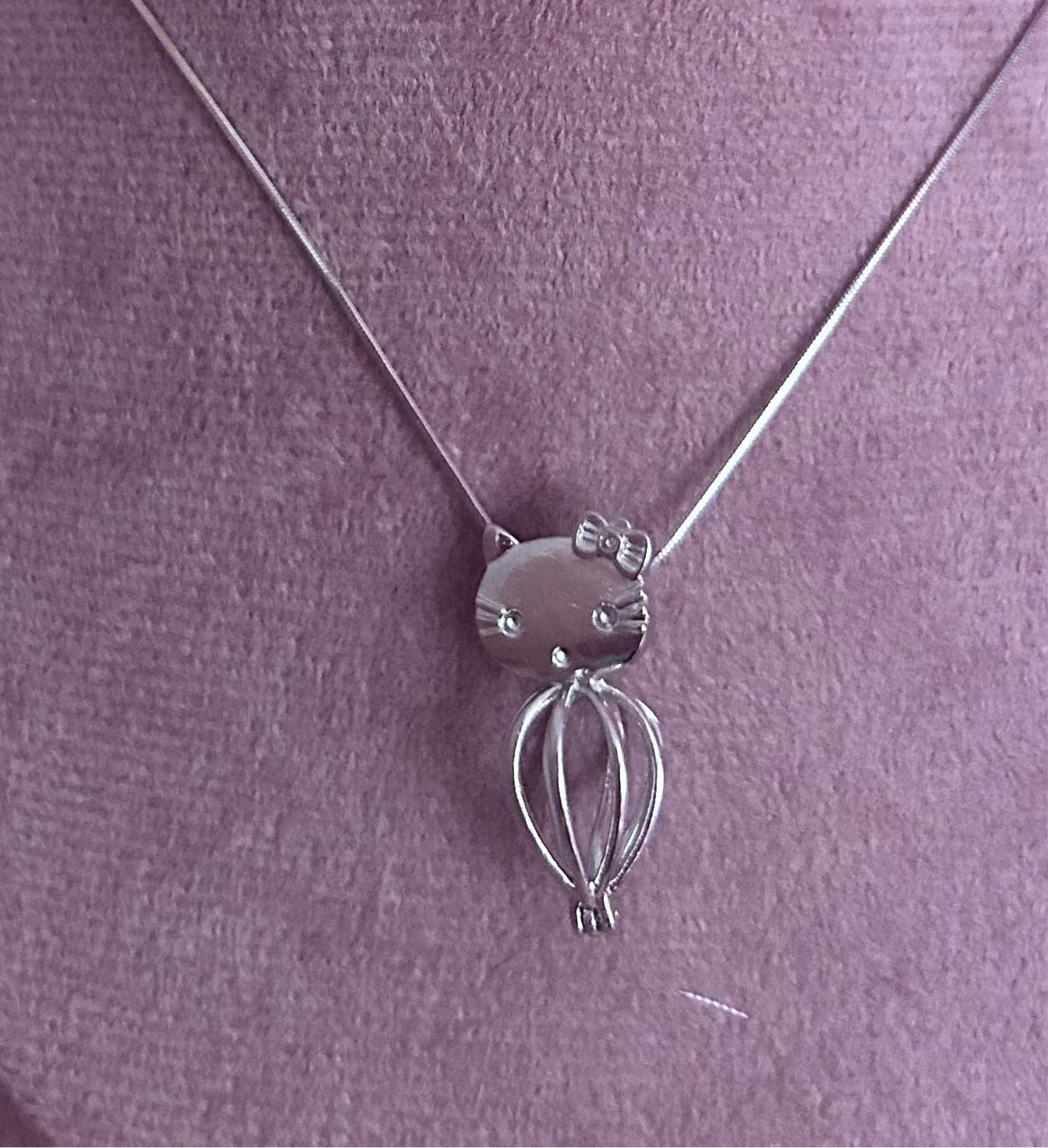 Silver plated hello kitty cage pendant
