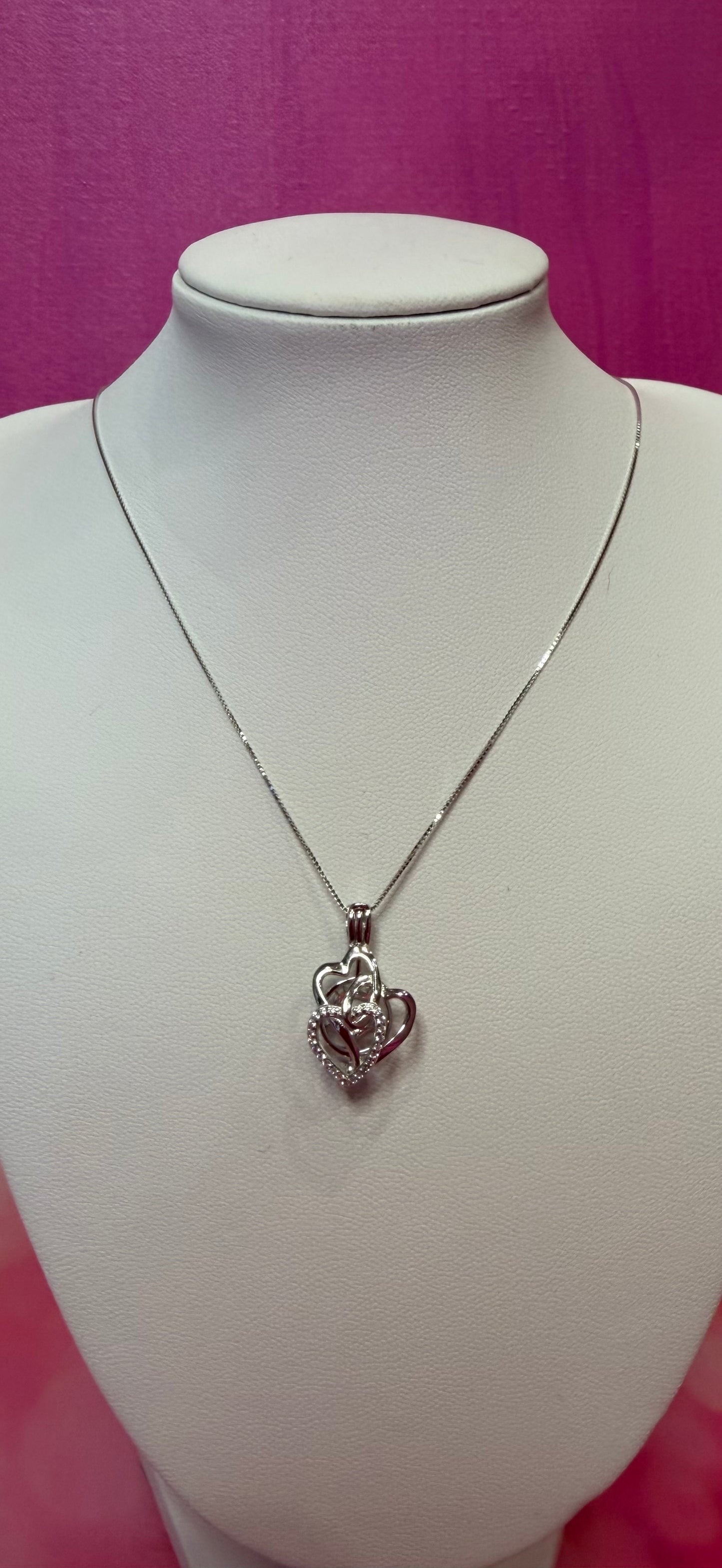 Sterling silver triple heart cage pendant