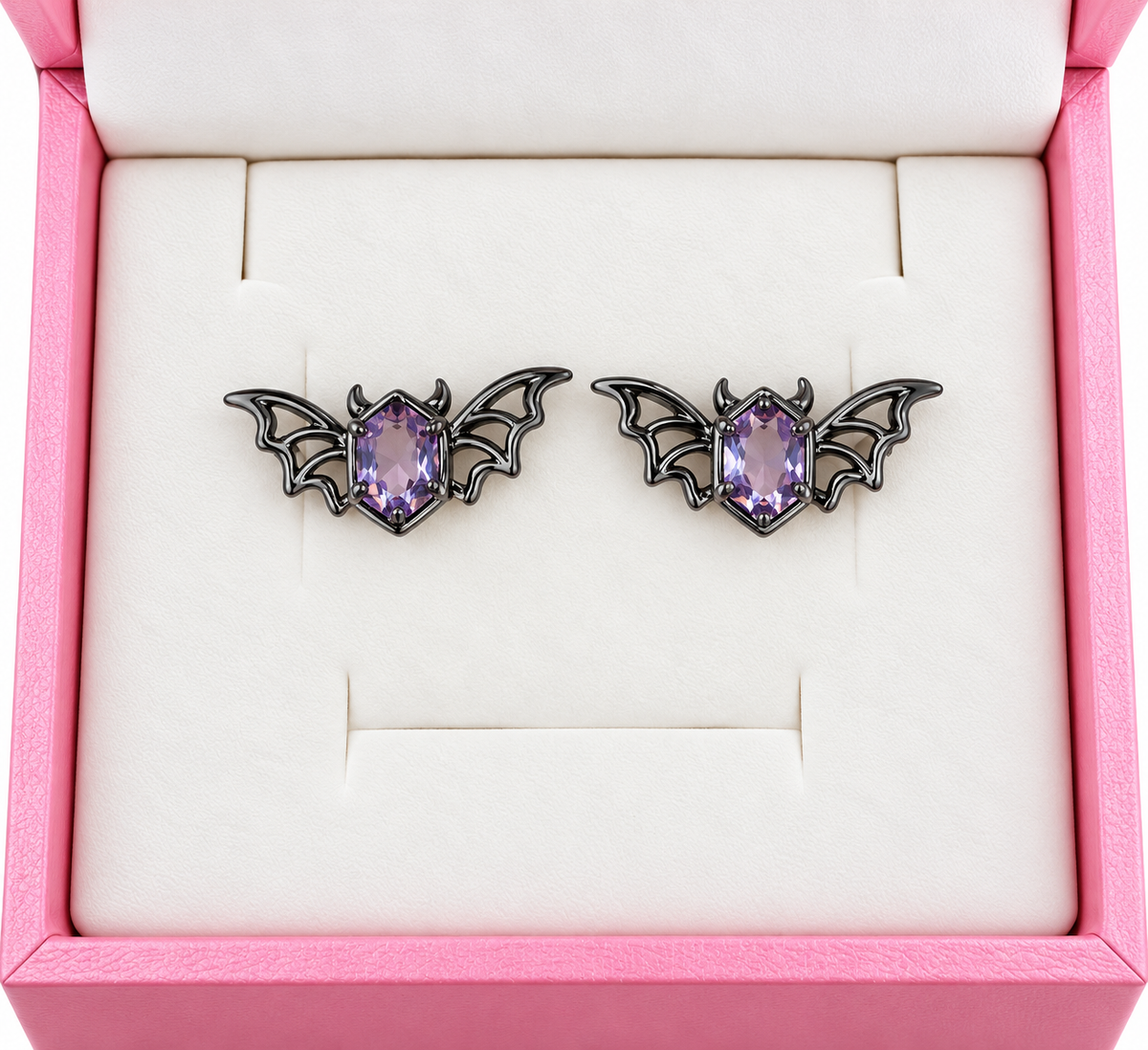 Black metal bat earrings with amethyst cubic zirconia