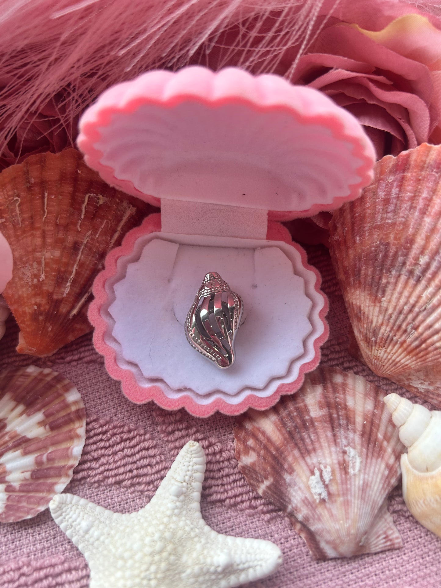 Silver plated conch shell cage pendant