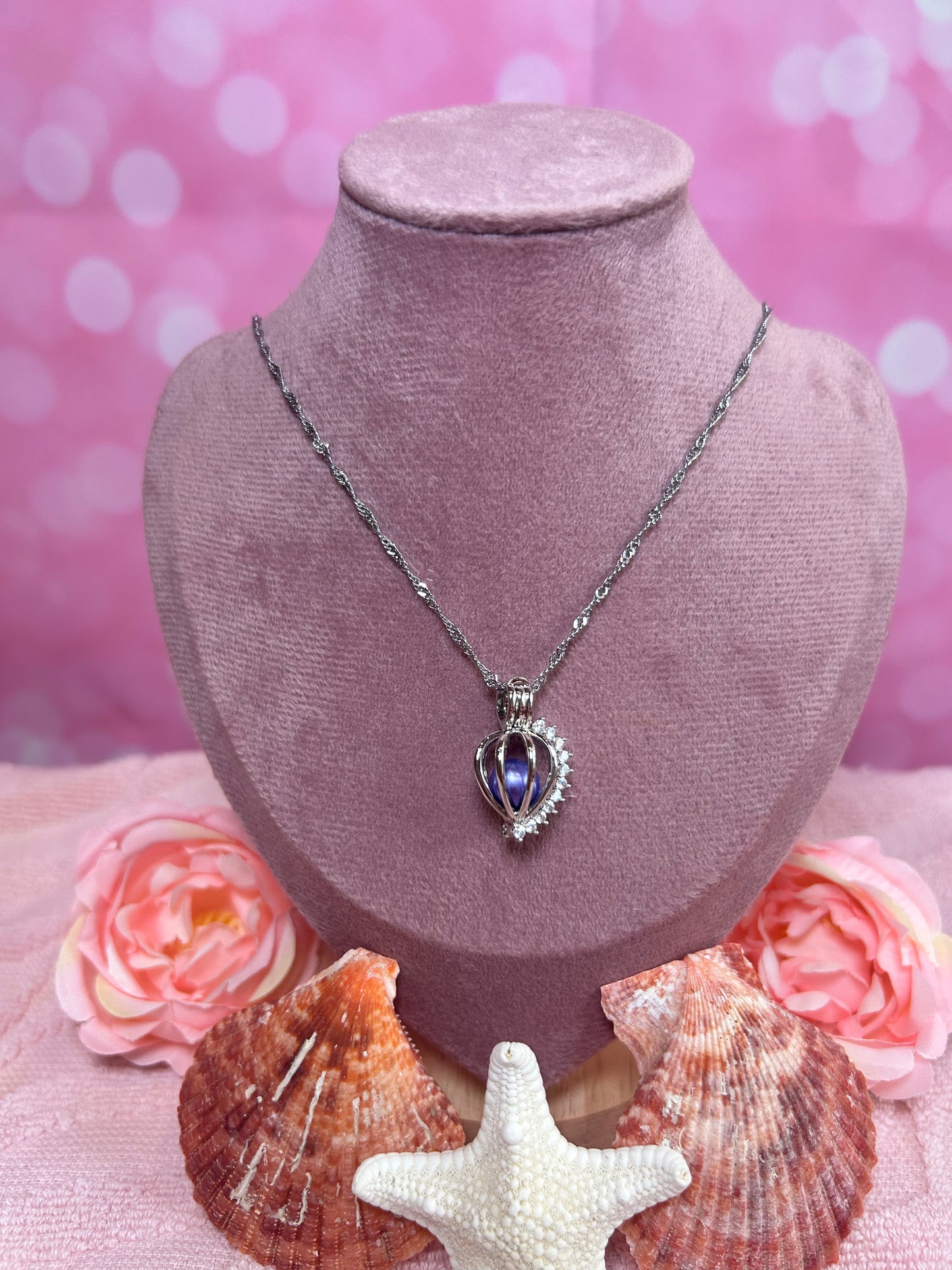 Silver plated round cage with cubic zirconia