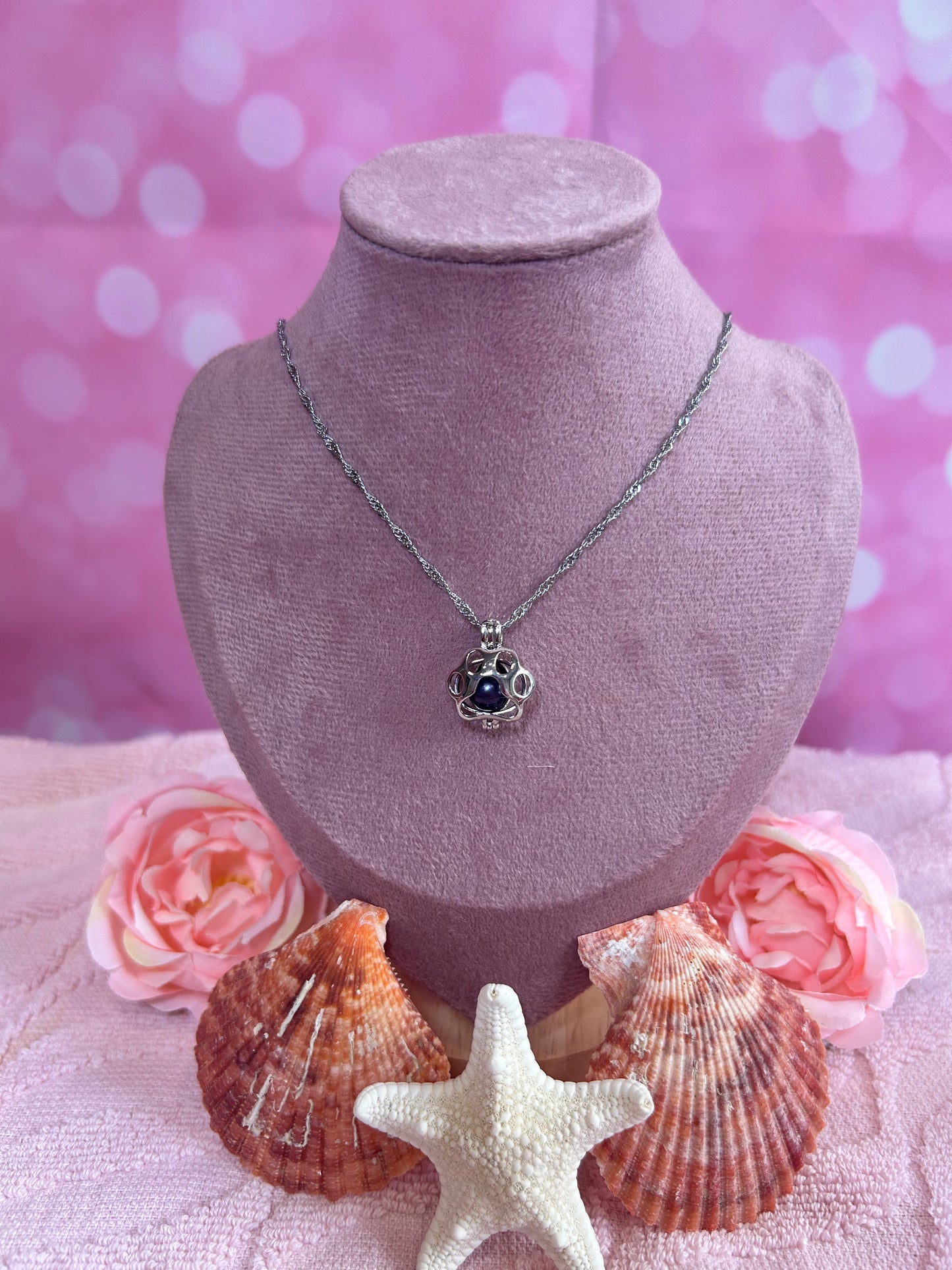 Silver plated paw cage pendant