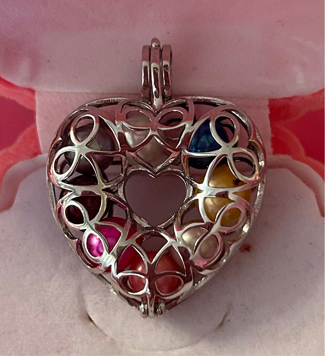 Sterling silver full heart cage pendant