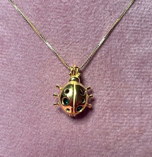 Sterling silver gold plated lady bug cage pendant