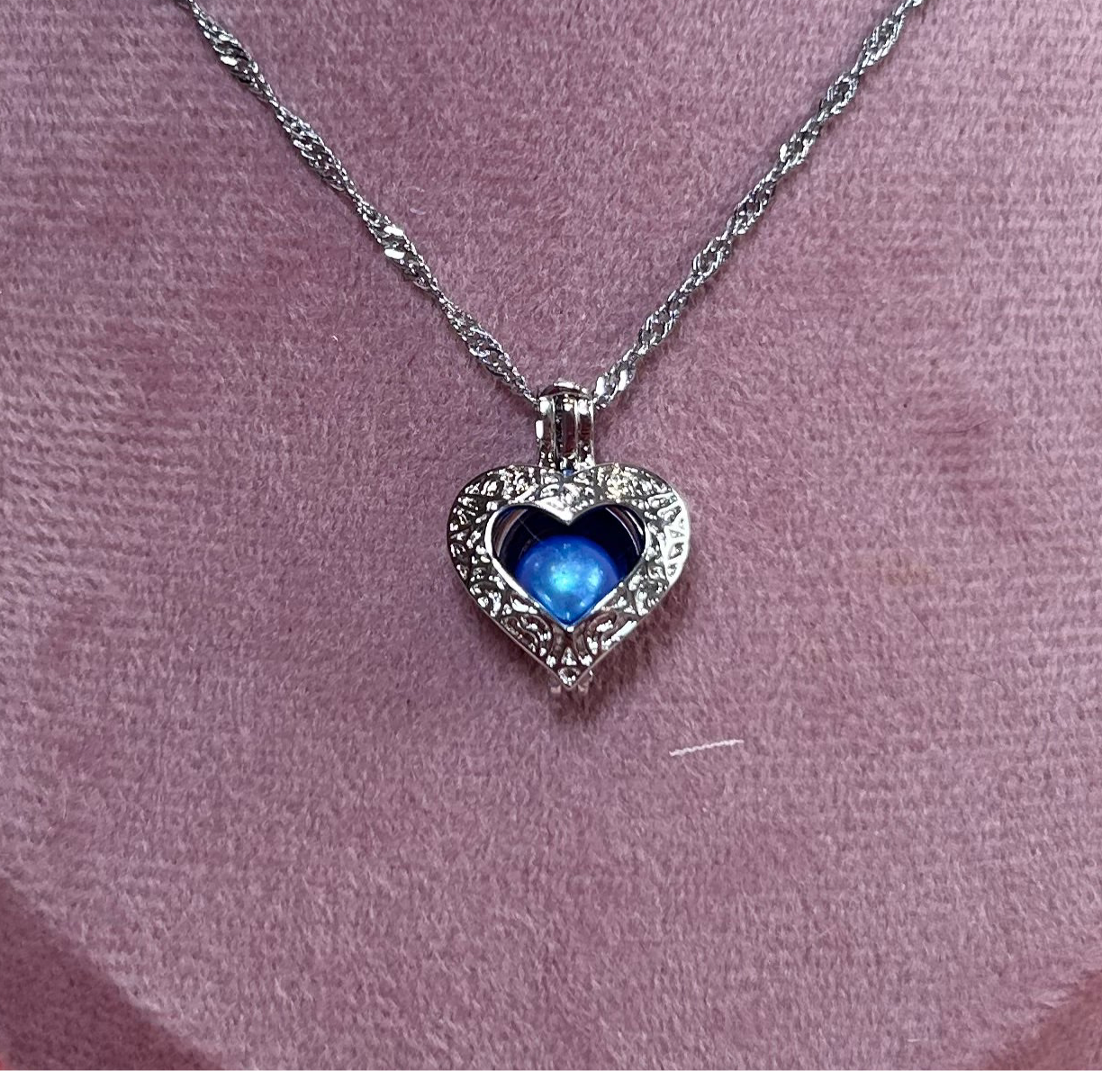 Silver plated open heart cage pendant