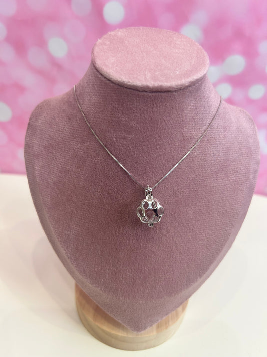 Sterling silver paw cage pendant