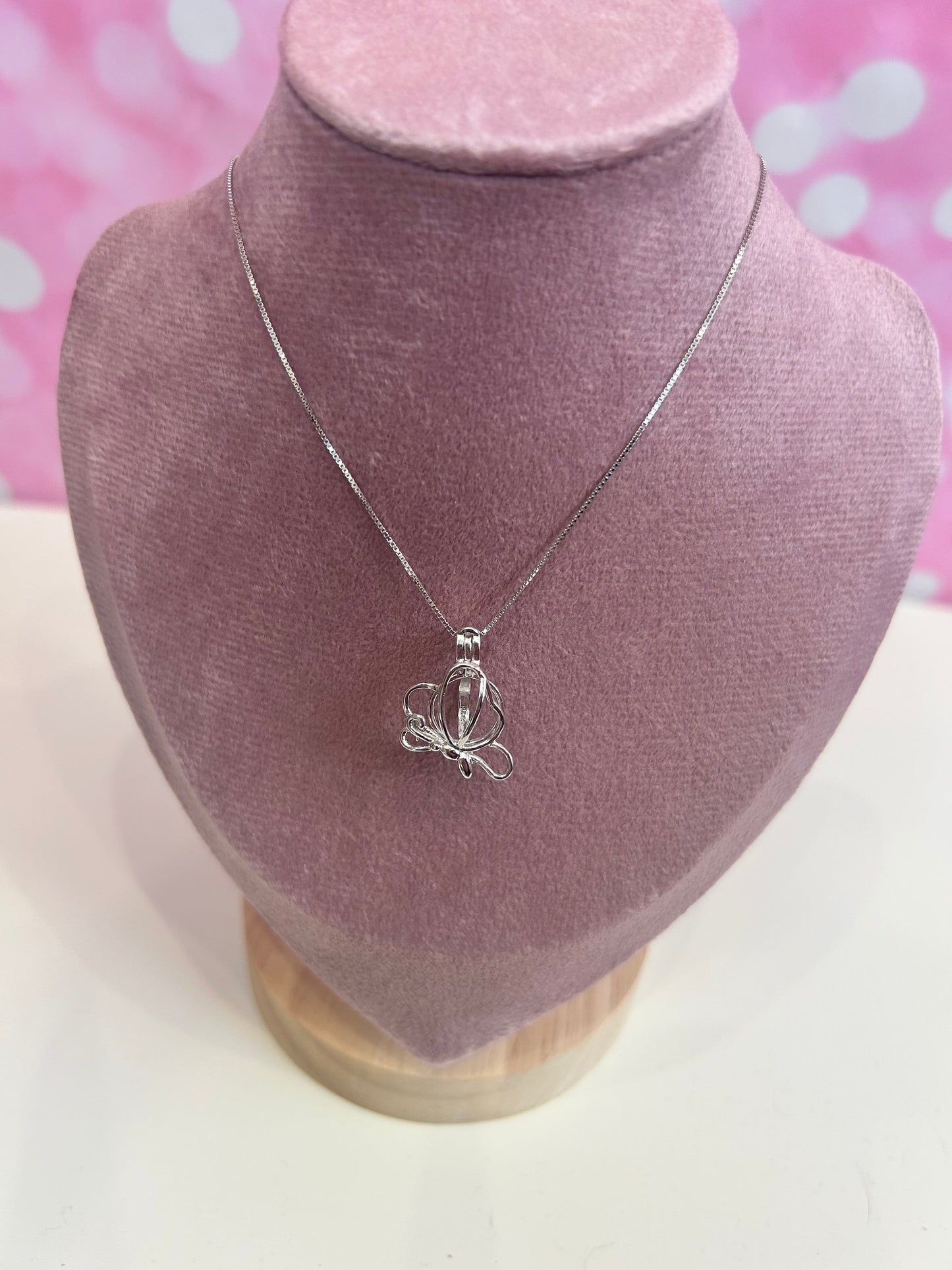 Sterling silver butterfly cage pendant