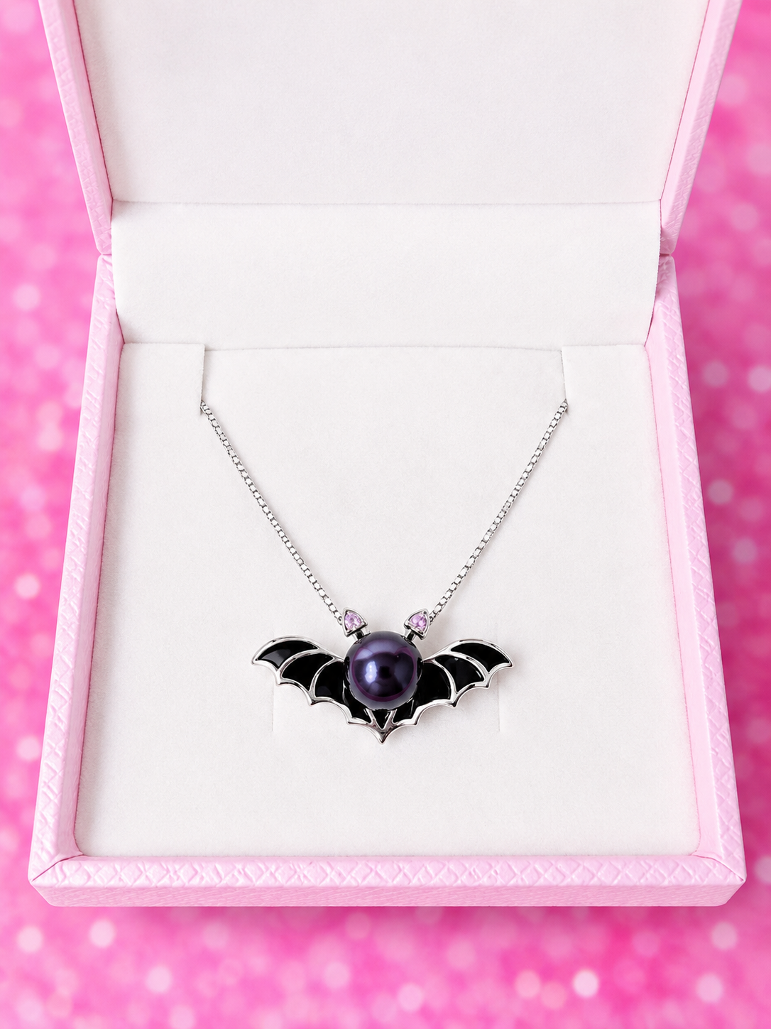 Sterling silver bat pendant with black pearl