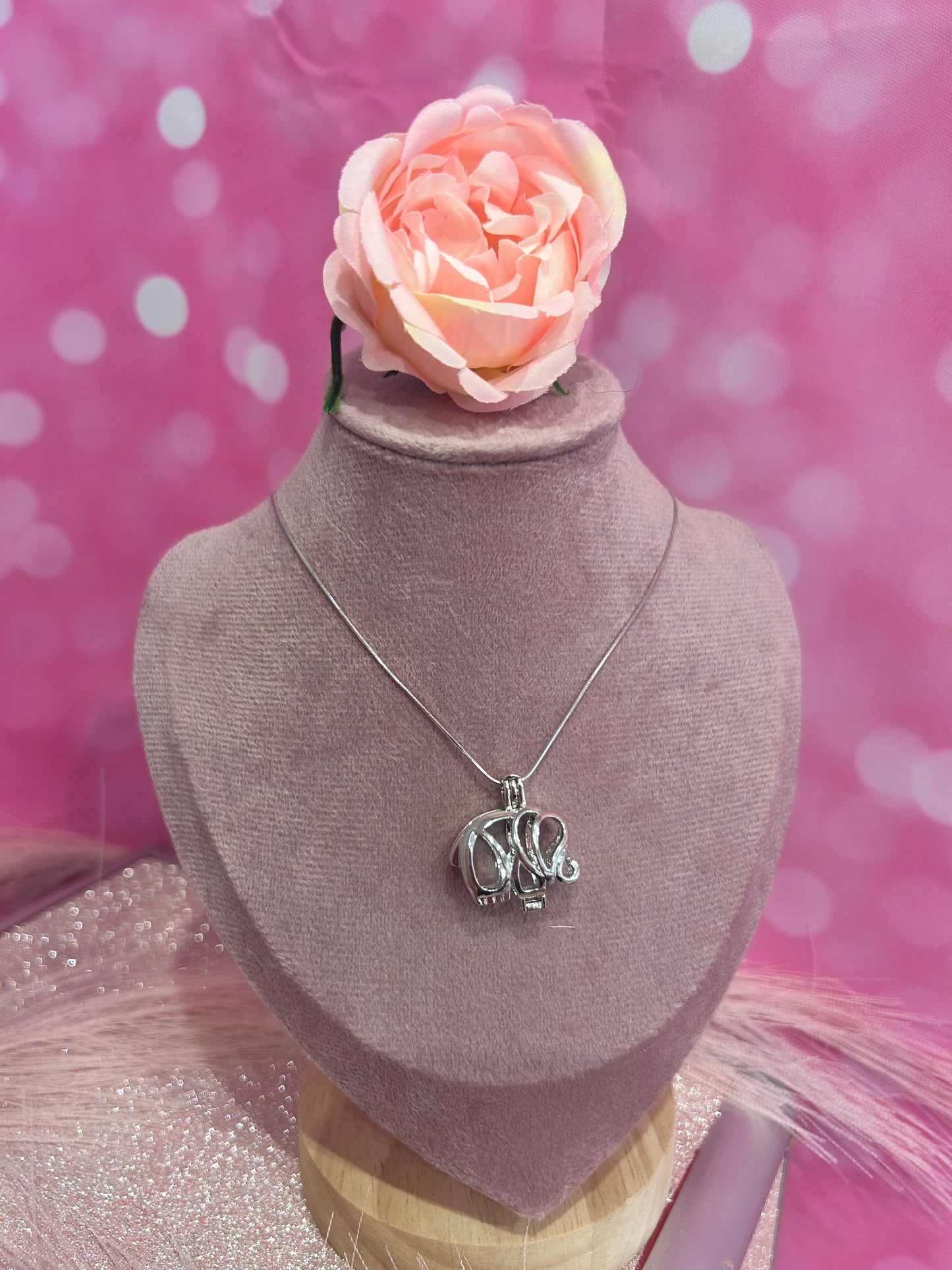 Silver plated elephant cage pendant