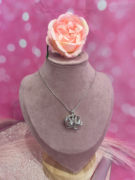 Silver plated elephant cage pendant