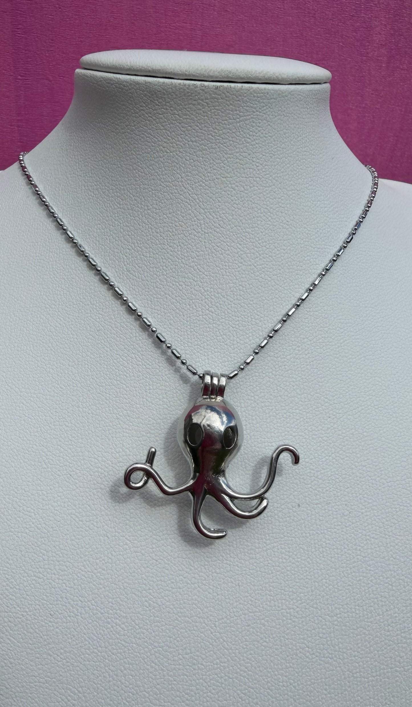 Silver plated octopus cage pendant