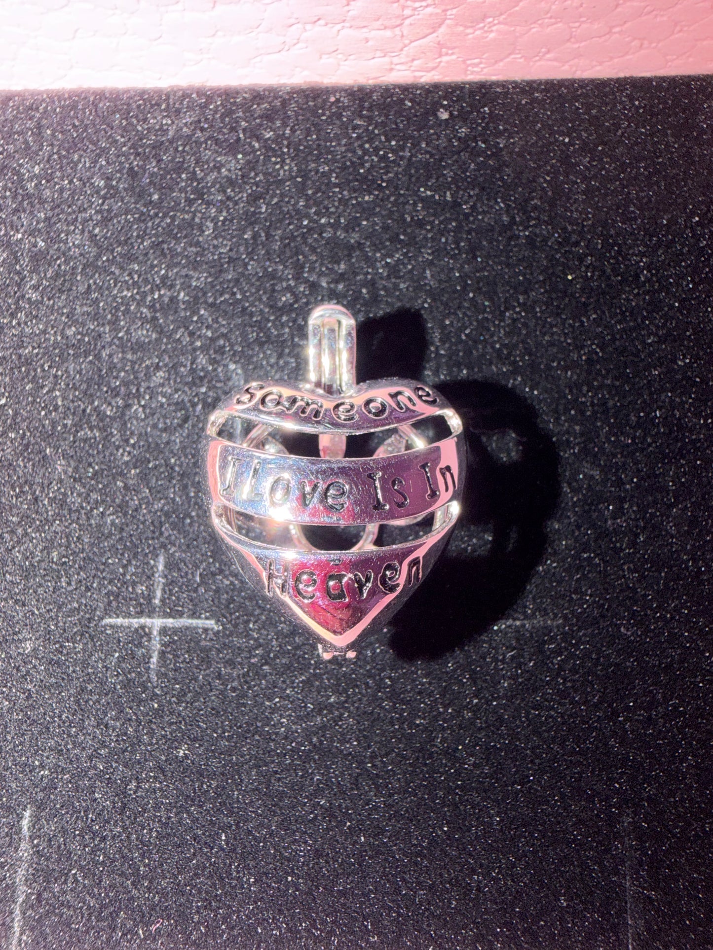 Sterling silver “someone I love is in heaven” Edison cage pendant