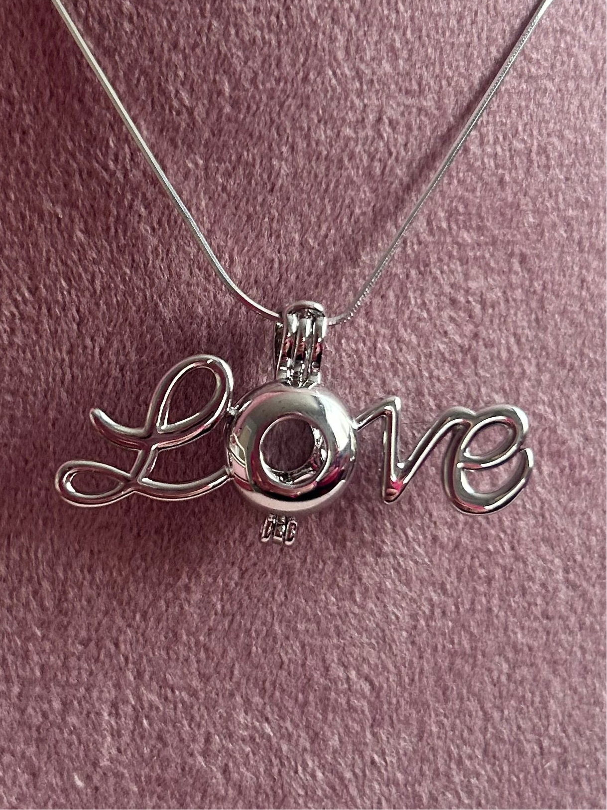 Silver plated love cage pendant