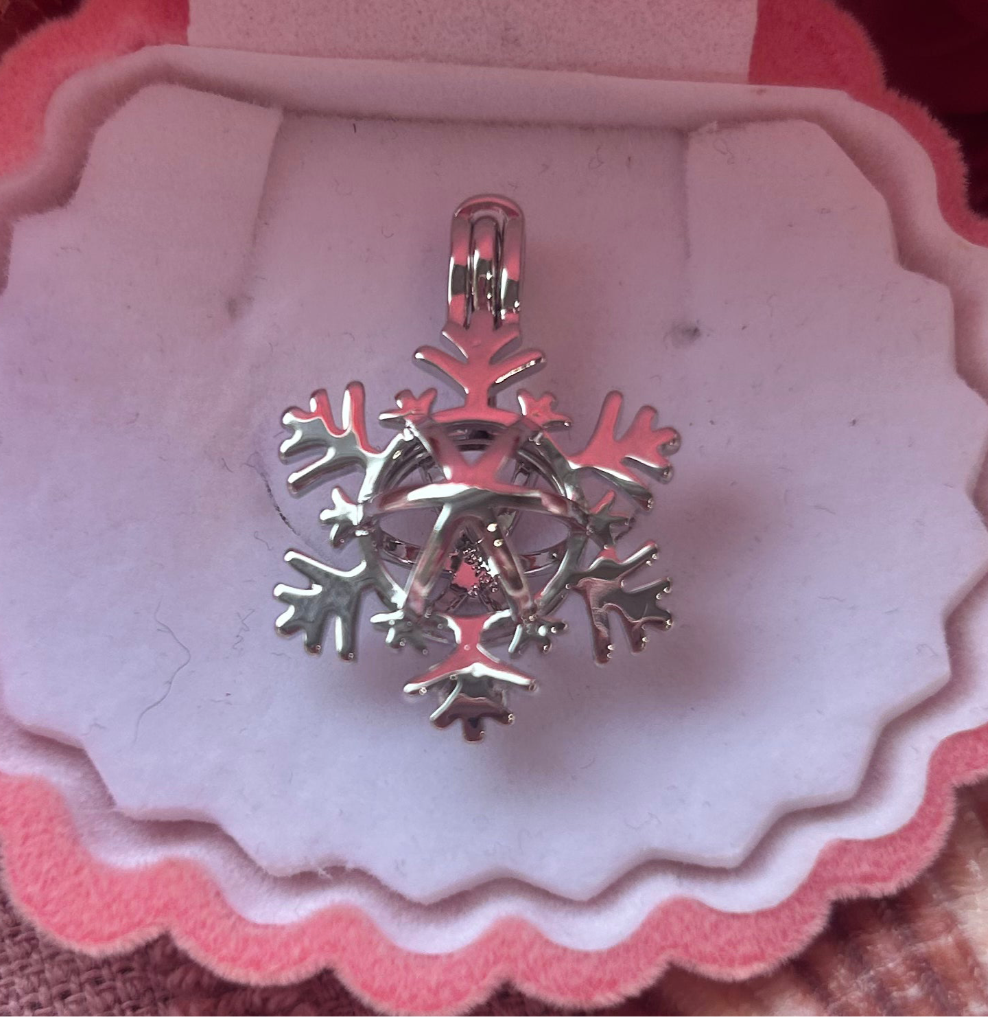 Silver plated snowflake cage pendant
