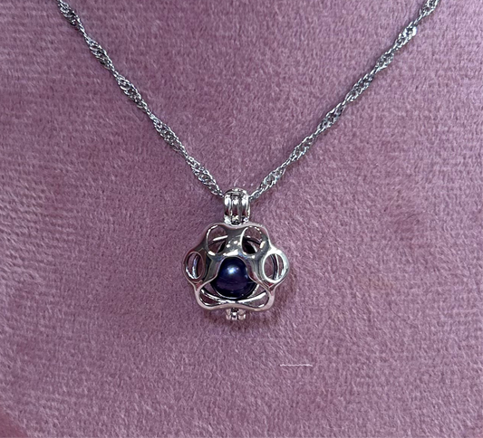 Silver plated paw cage pendant