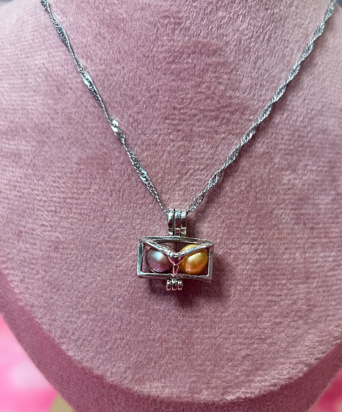 Cute silver plated envelope cage pendant