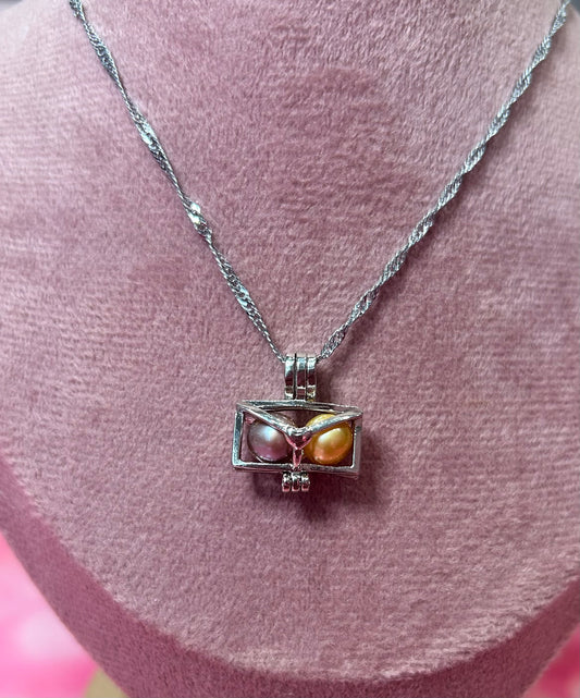 Cute silver plated envelope cage pendant