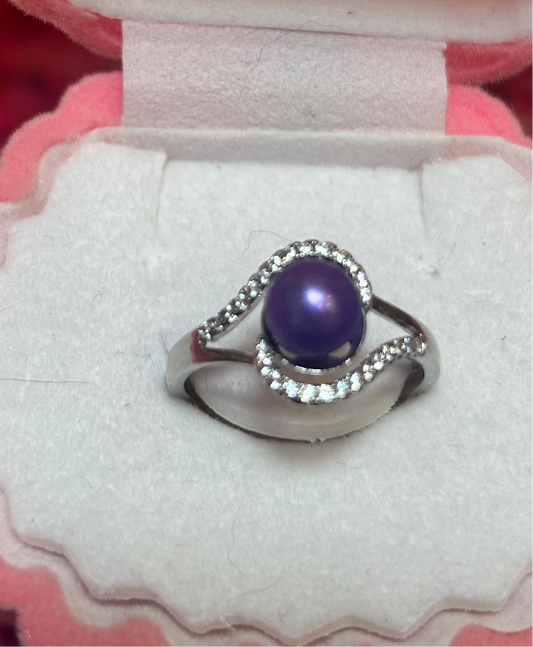 Stunning silver plated adjustable cubic zirconia twist ring