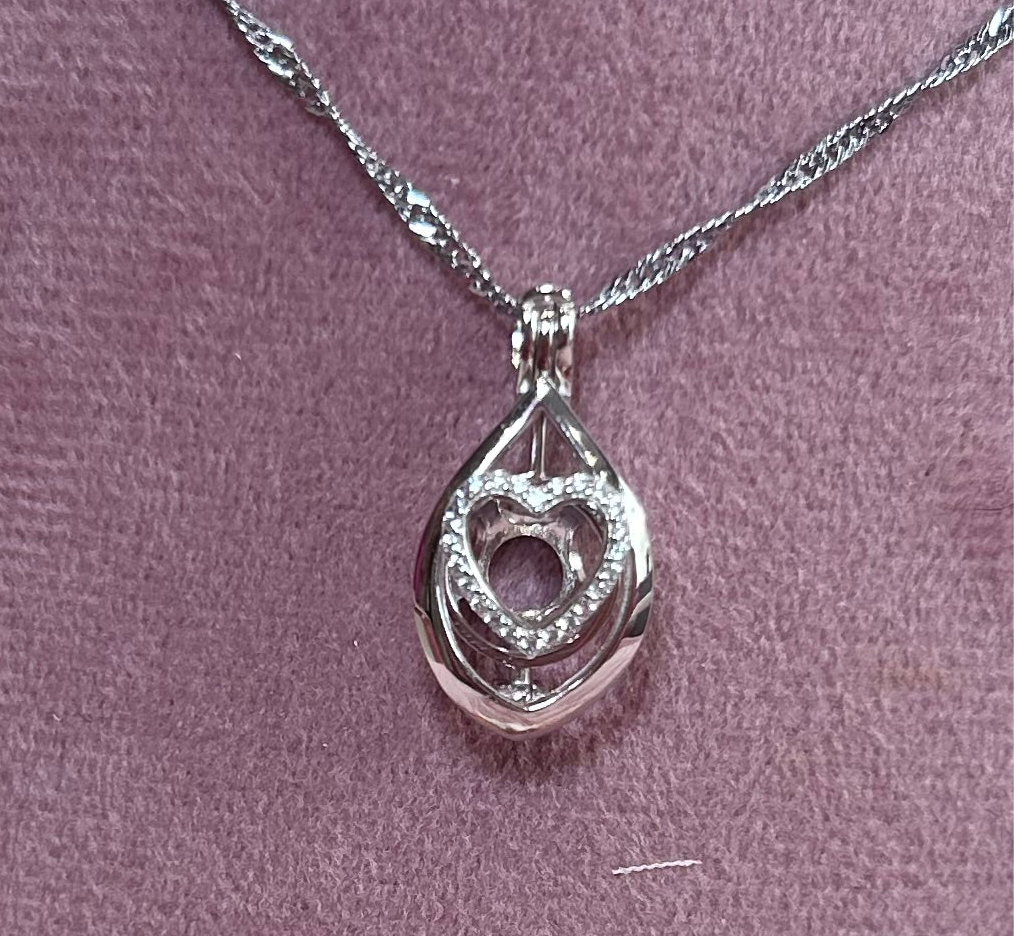 Sterling silver cubic zirconia heart drop cage pendant