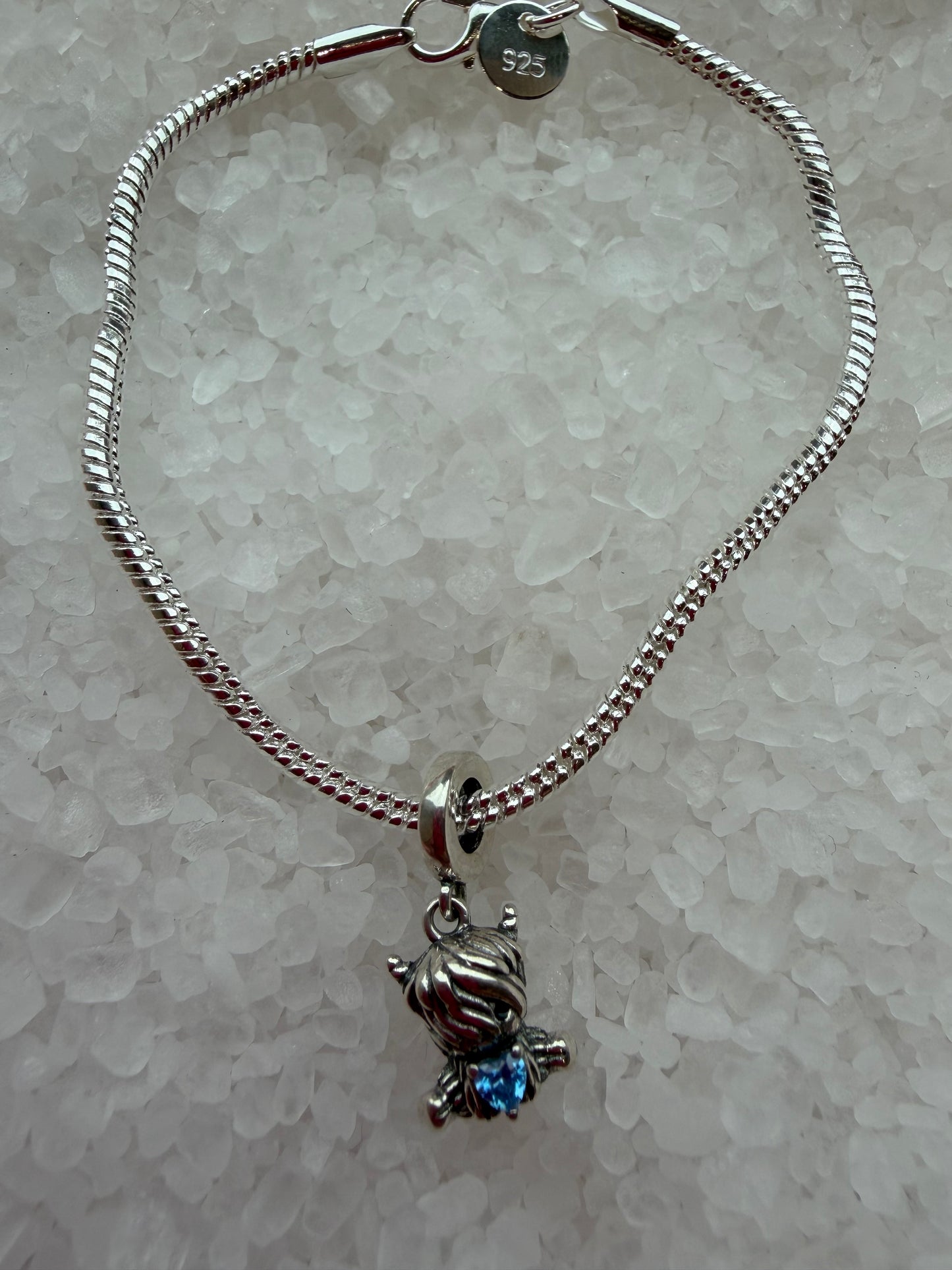 Silver plated cute highland cow bracelet with blue cubic zirconia