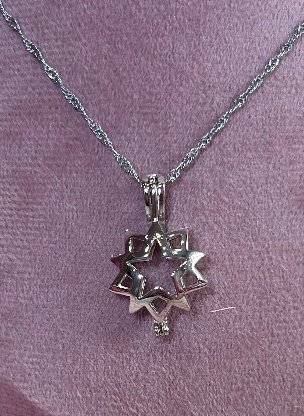 Silver plated double star cage pendant