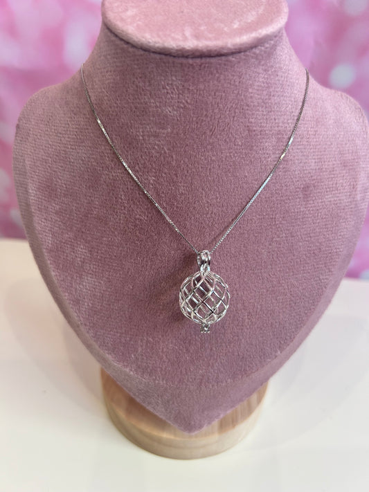 Twisted round cage pendant