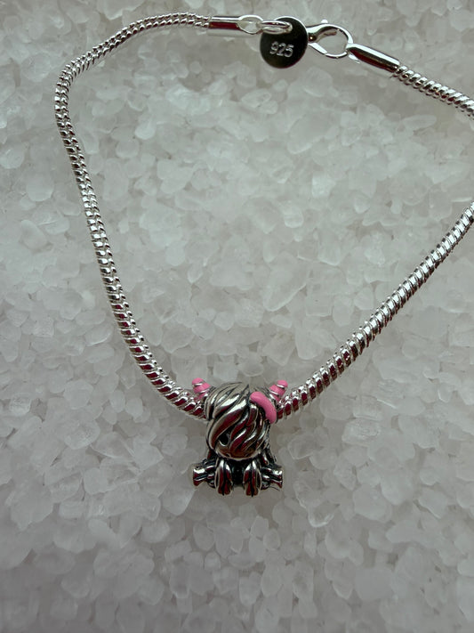 Silver plated highland cow bracelet with pink horns