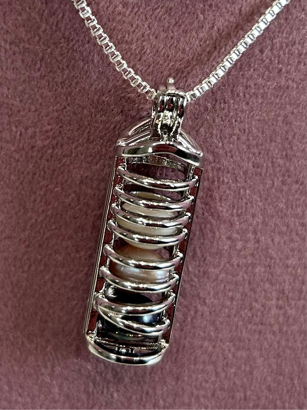 Silver plated long cage pendant