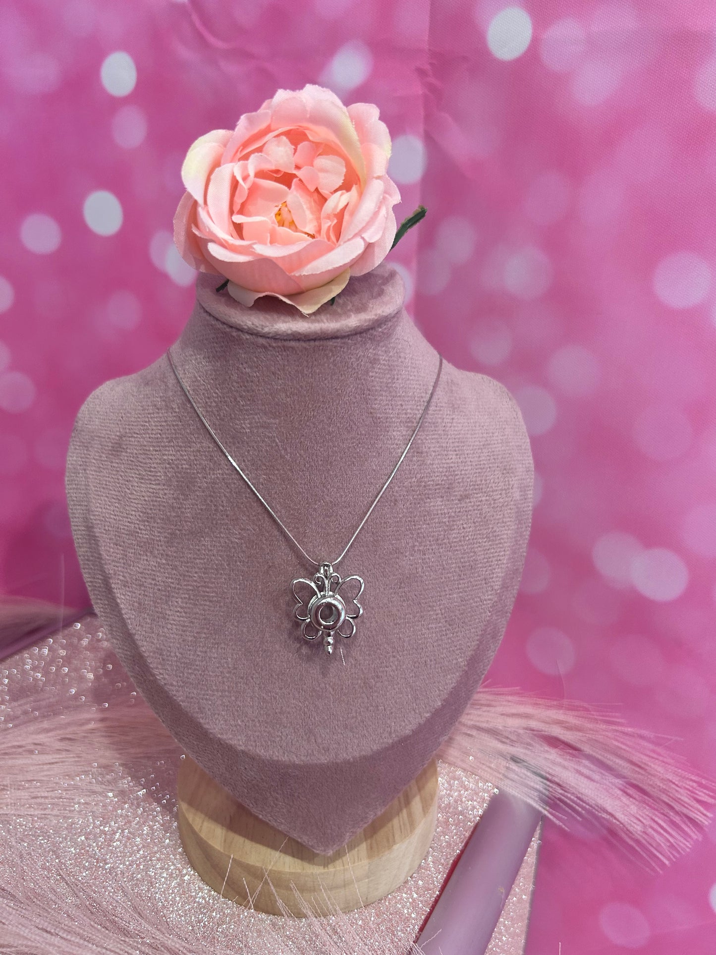 Silver plated butterfly cage pendant