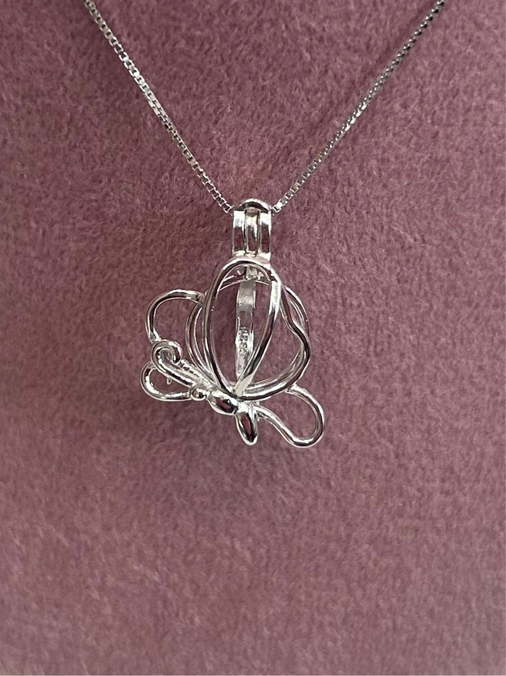 Sterling silver butterfly cage pendant