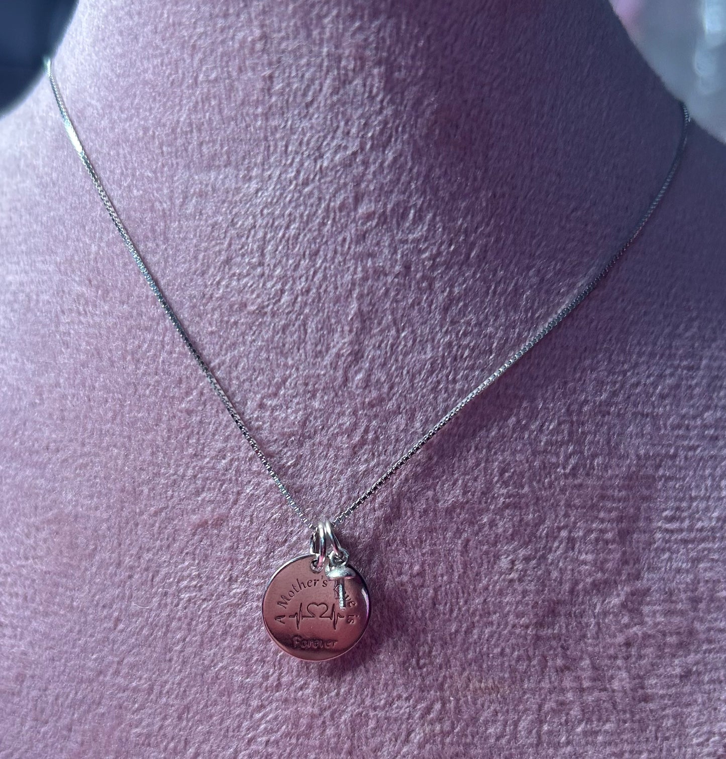 Sterling silver “a mothers love is forever” pendant