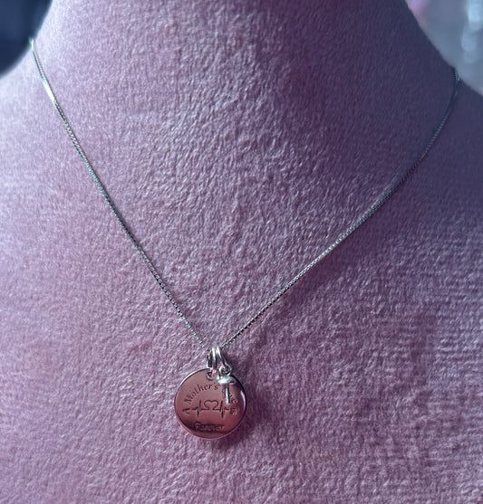 Sterling silver “a mothers love is forever” pendant