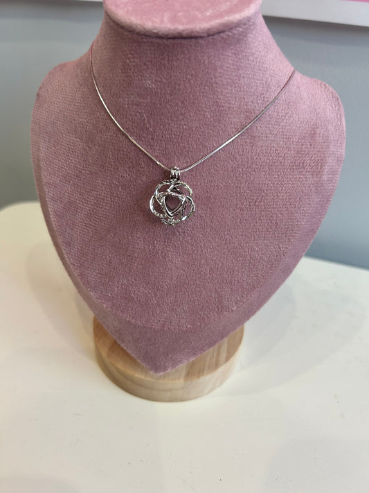 Silver plated round rose cage pendant