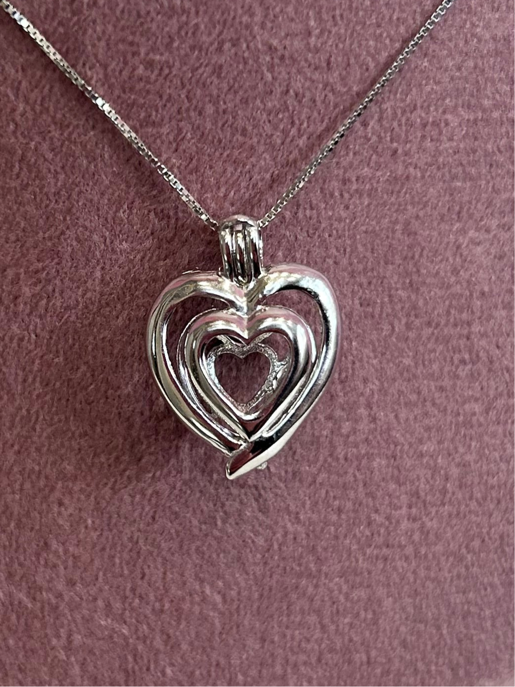 Sterling silver double heart cage