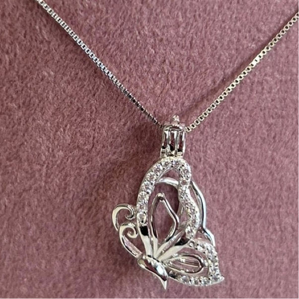 Sterling silver cubic zirconia butterfly cage pendant