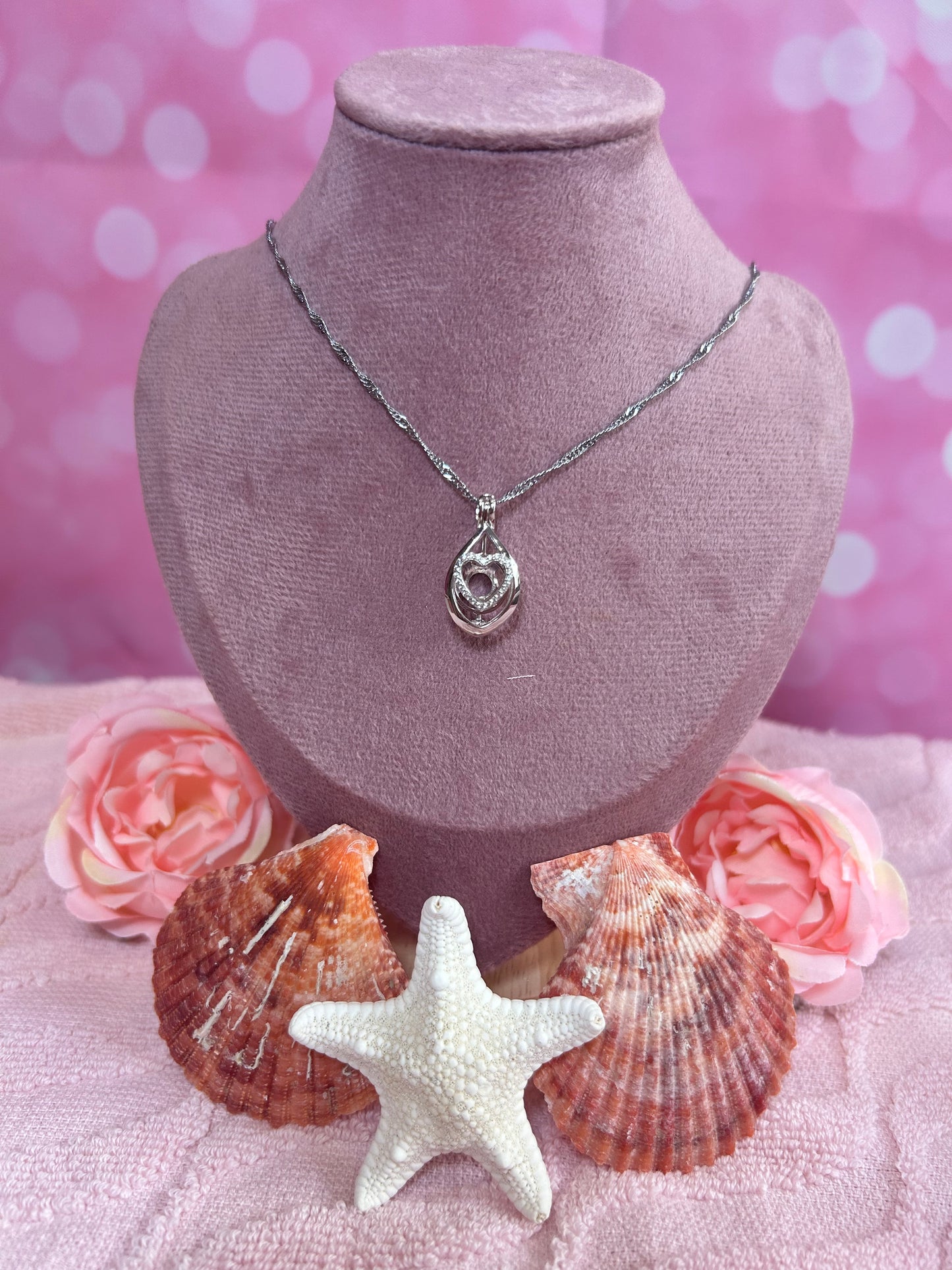 Sterling silver cubic zirconia heart drop cage pendant