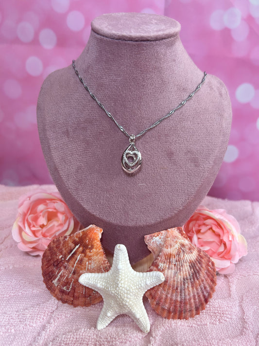 Sterling silver cubic zirconia heart drop cage pendant