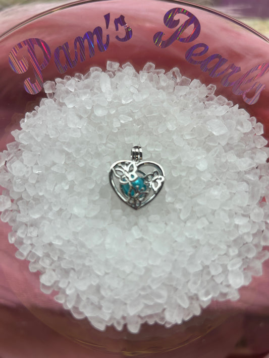 Silver plated butterfly cage pendant