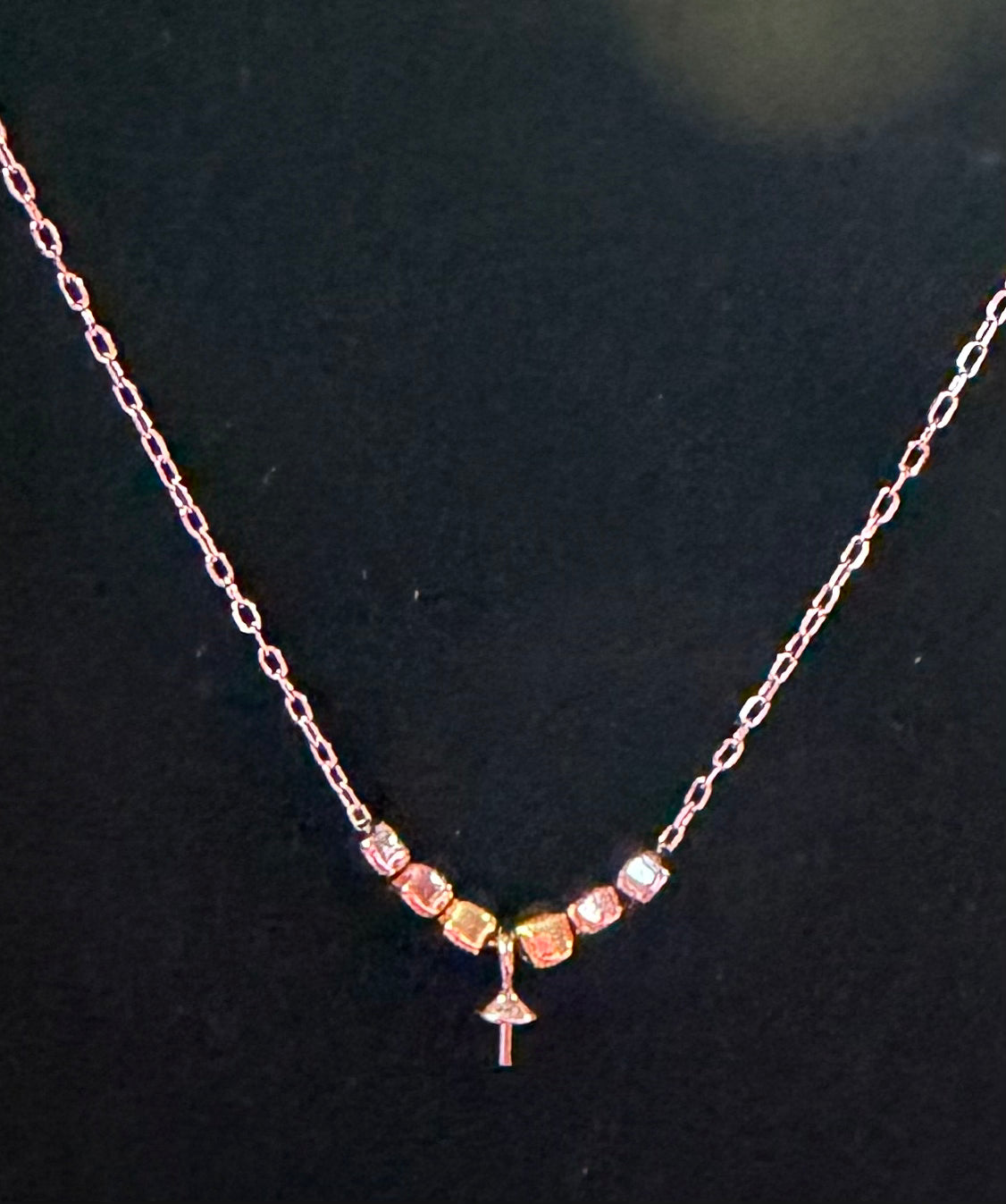 Sterling silver mixed metal drop mounted necklace