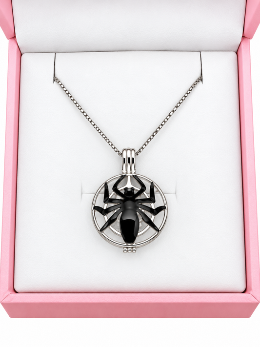 Sterling silver spider cage pendant
